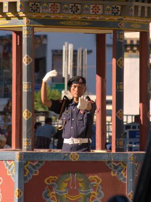 Policeman giving singal in Thimphu